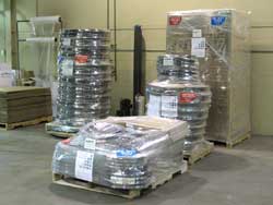 Automatic shrink wrapping station